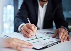 People go over paperwork