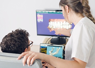 Dentist in Marlton capturing digital impressions for a custom dental crown 