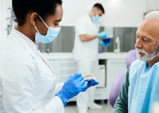 Male patient inquiring about new dentures     