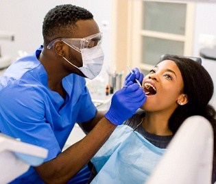 Dentist placing metal free restorations in Marlton