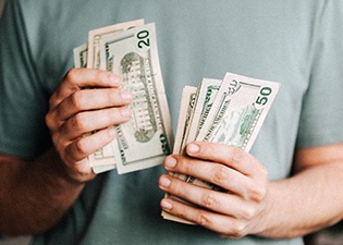 Hands counting cash