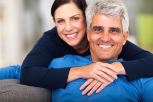 smiling couple in an embrace