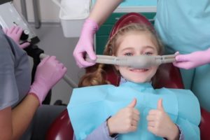 Young child at the dentist receiving nitrous oxide sedation.